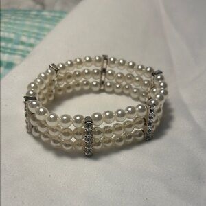 Triple Row Pearl Bracelet with Silver Detailing
